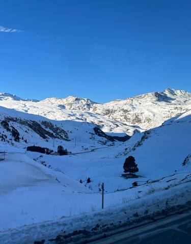 Panoramic view of a snowy mountain range.