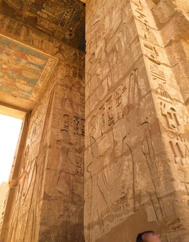 Close up of ancient Egyptian wall carvings.