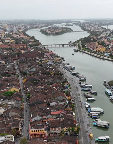 Aerial view of a city with a river running through it.