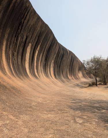 Natural rock formation resembling ocean waves.