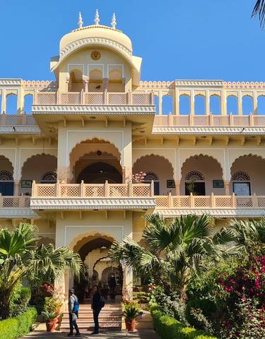 Impressive historical building with arches and domes.
