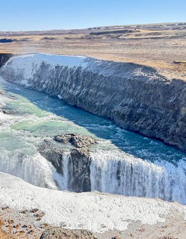 Wide-angle view of Gullfoss waterfall.