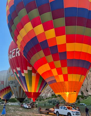 Colorful hot air balloons ready for flight.