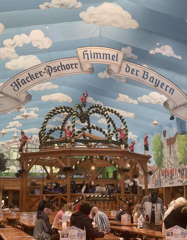 Decorative beer hall interior with festive garlands.