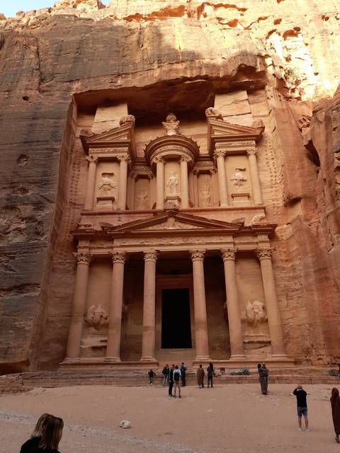 The iconic Petra Treasury carved into sandstone rock.