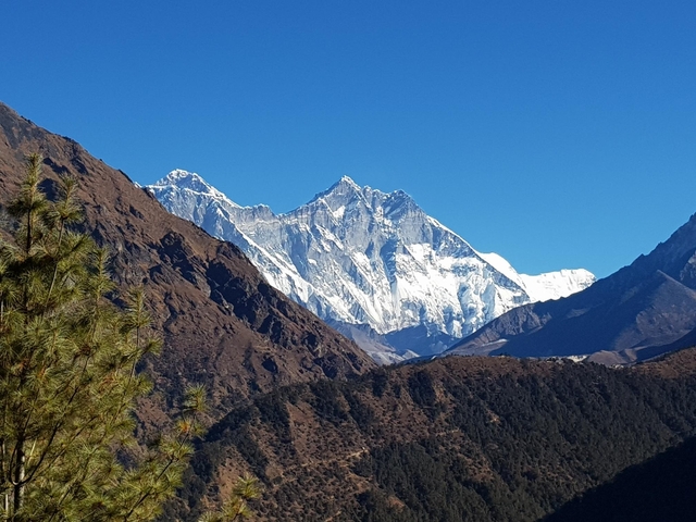 Majestic view of Mount Everest with clear blue skies.