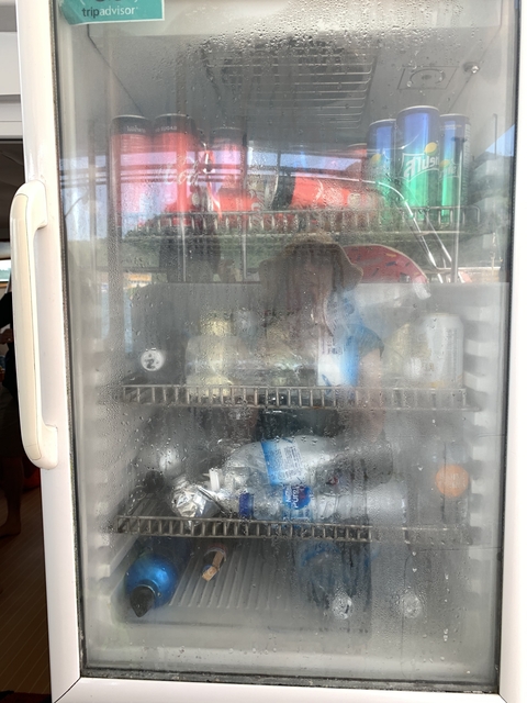 Fogged glass with items visible inside.