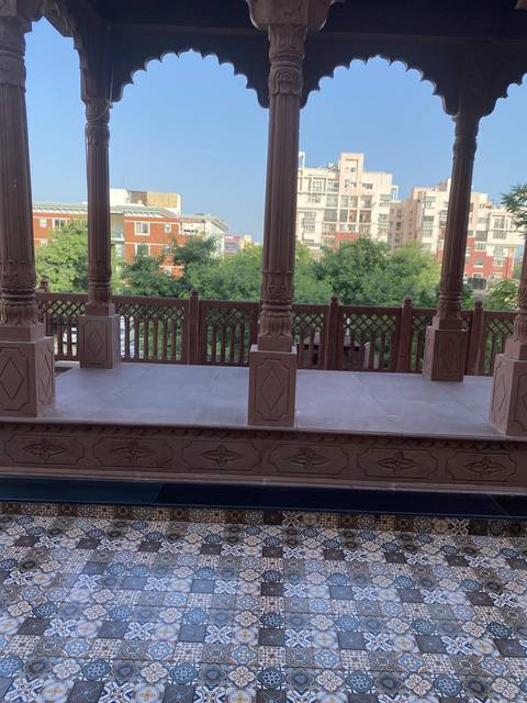 Balcony view towards a cityscape.