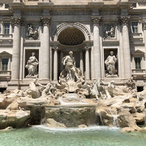 Statues and a fountain at the Trevi Fountain.