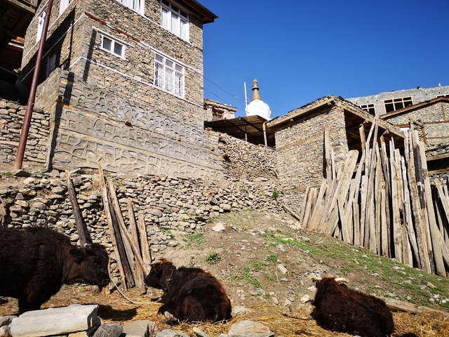Village with stone buildings on a hillside