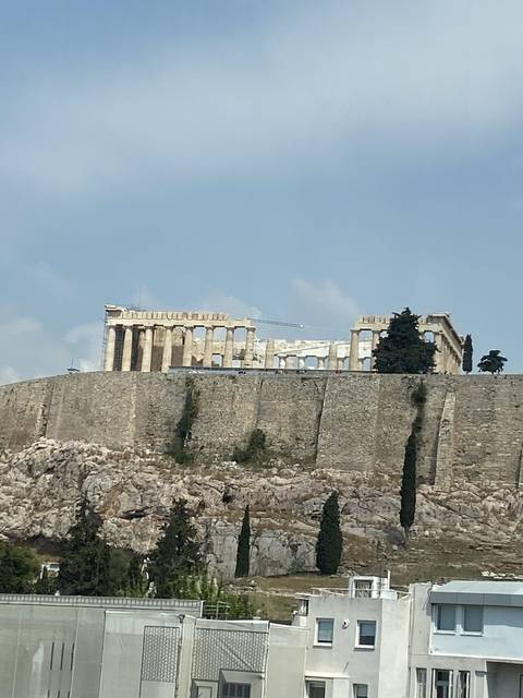 Parthenon on the Acropolis of Athens viewed from a distance.