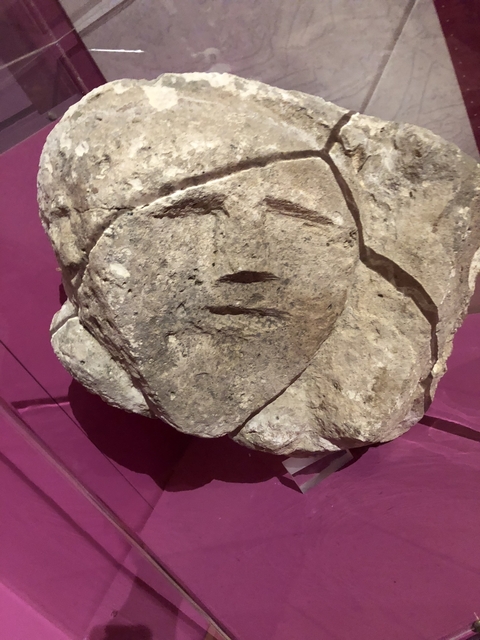 Close-up of a carved stone artifact.