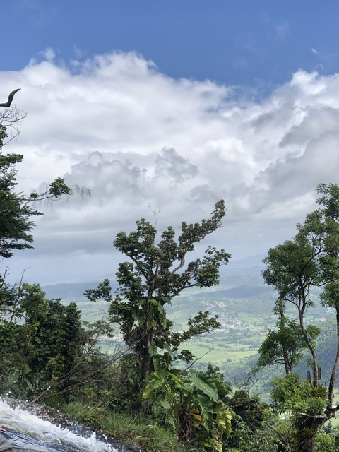 Cloudy sky over a vast landscape.