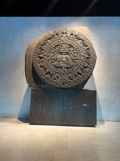 An ancient stone artifact resembling a sun calendar.