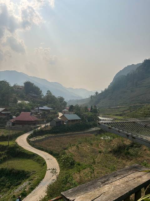 Scenic view of a valley and village.