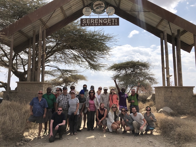 A group photo under the Serengeti National Park sign.