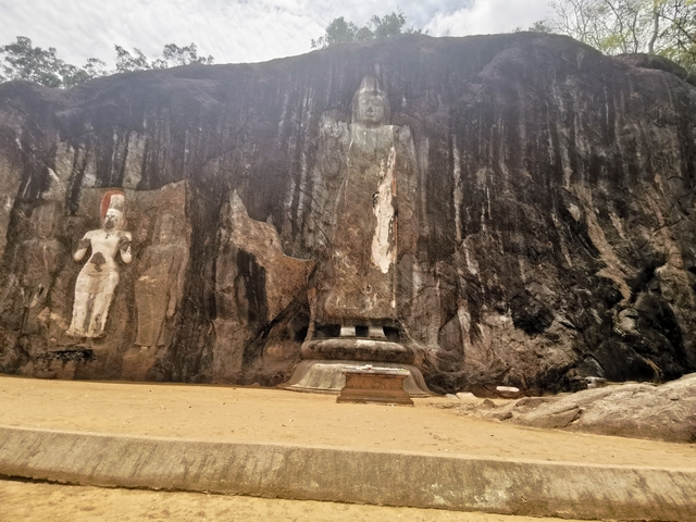 Rock carvings on a cliff face.