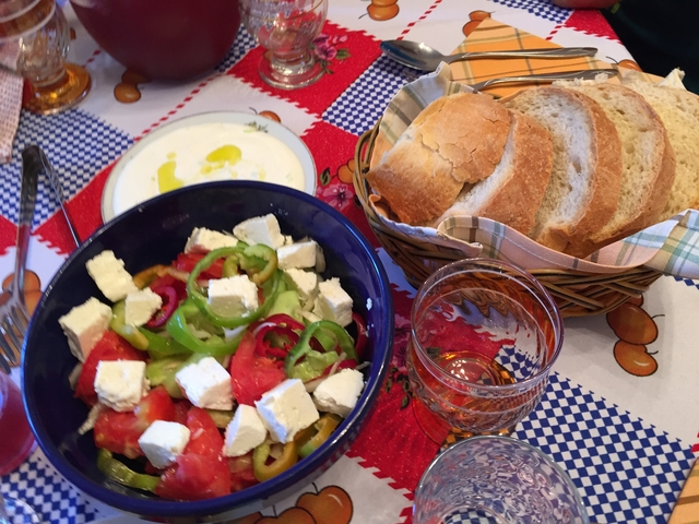 Traditional salad with feta cheese and bread.