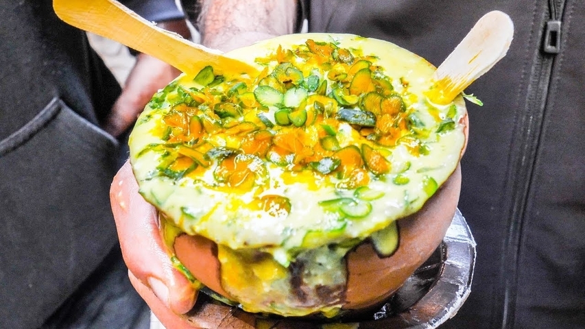 Street food dish held in hands.