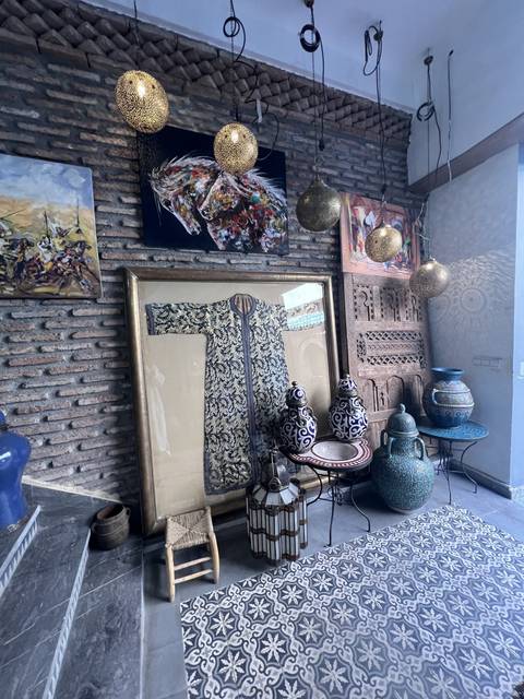 An artistic display of objects and decorations on a wall.