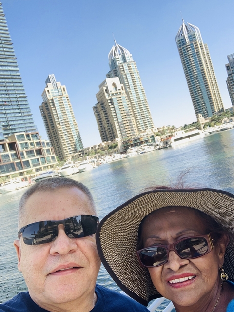 Close-up of a couple with the Marina in the background.