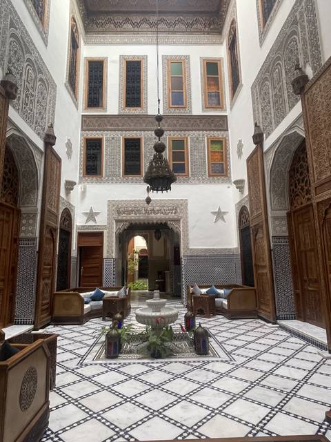 Intricately designed interior courtyard of a traditional Moroccan house.