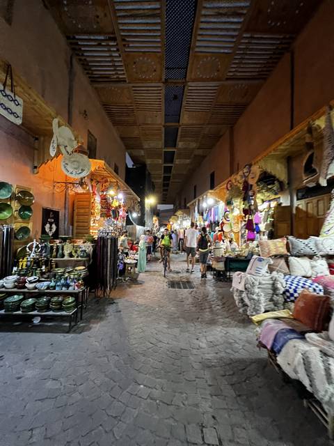 A vibrant and busy market at night.