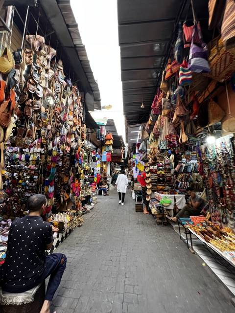 A diverse range of goods displayed in a bustling market.
