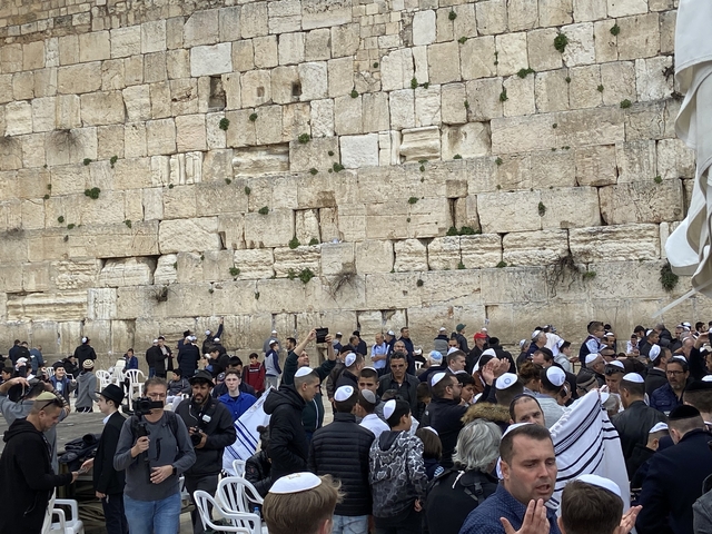 People gathered at the Western Wall.