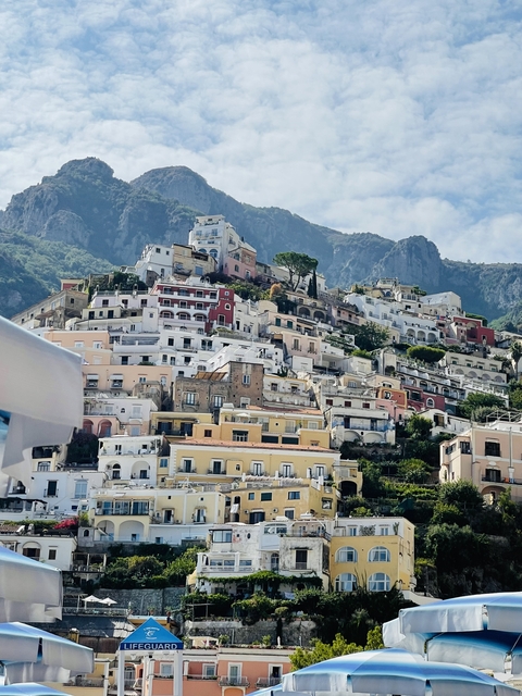 View of a hillside town with colorful houses.