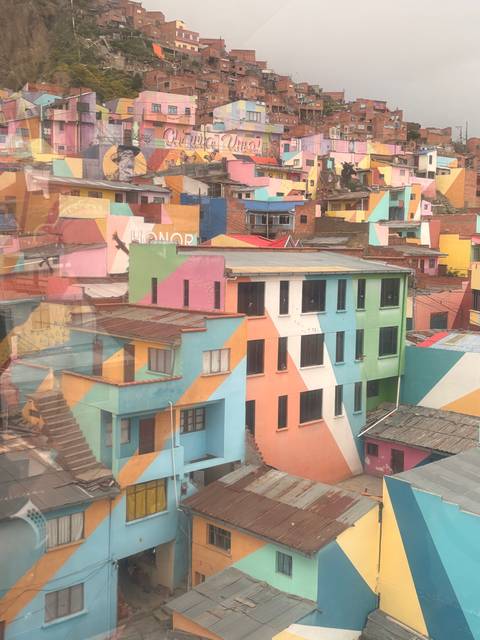 Colorful houses in a hilly area.