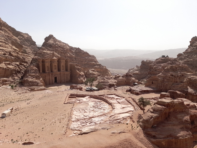 The Monastery at Petra with surrounding mountains.
