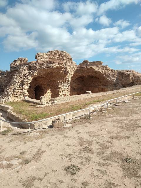 Ancient ruins against a blue sky.
