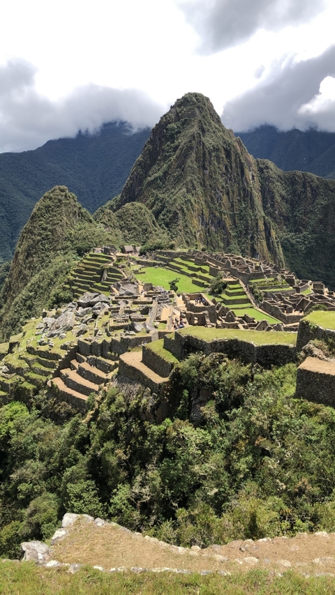 The ancient Inca city of Machu Picchu with terraced hills.