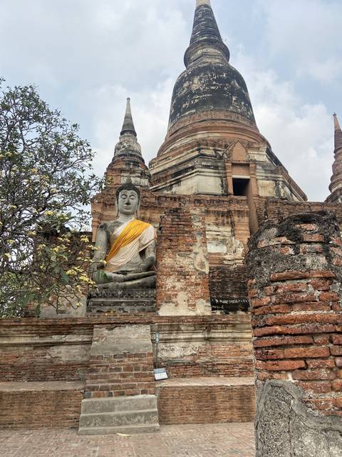 Historical brick structures in an ancient setting.