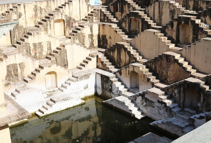 Ancient stepwell with intricate architecture.