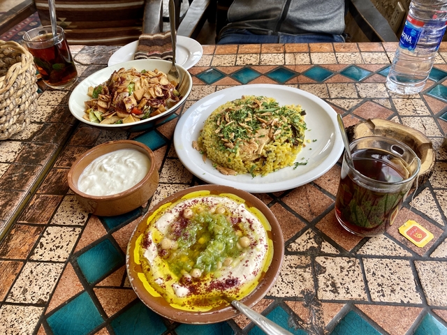 Traditional Middle Eastern dishes arranged on a table.