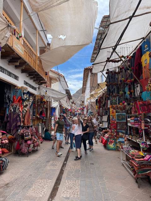 Group exploring a vibrant market street.