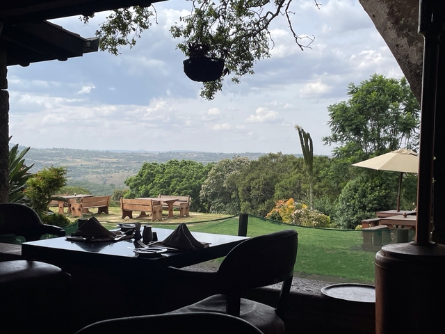 Outdoor dining area with a scenic landscape view.