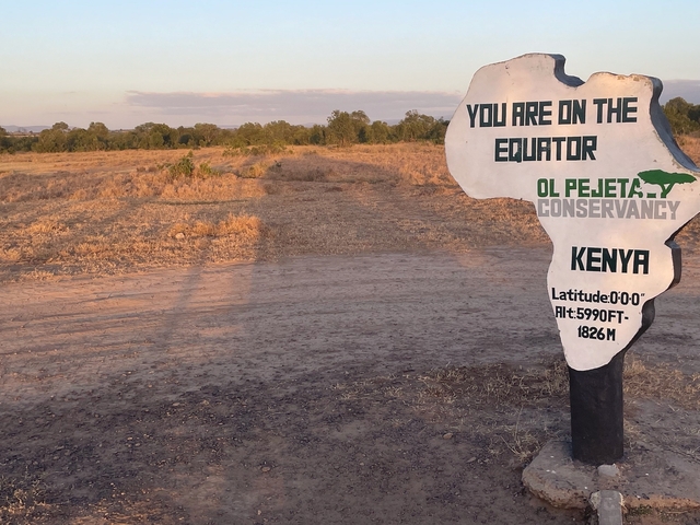 Sign indicating the equator line at Ol Pejeta Conservancy.