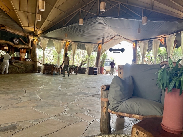 Open lobby area with seating in a resort setting.