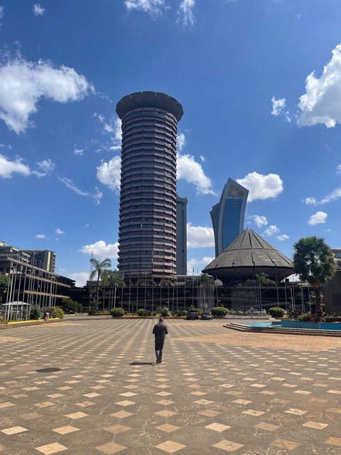 Modern city skyline with unique architectural structures.