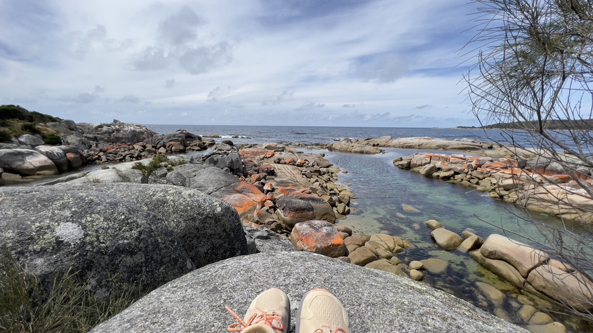 View of rocky shoreline from a sitting position.