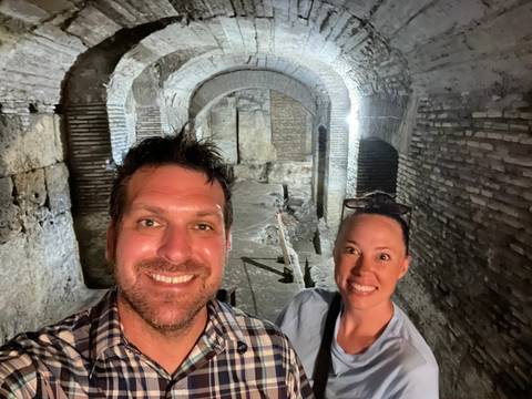 Upside-down photo of a couple in an ancient ruin.