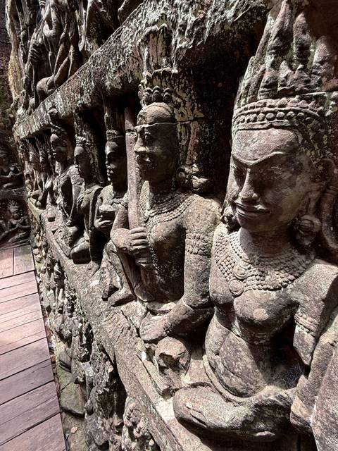 Intricate stone carvings on a wall.