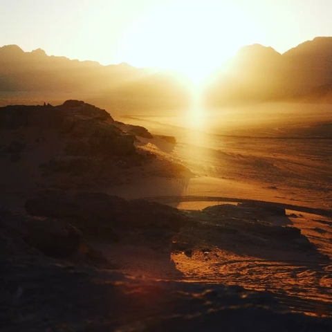 Sunset over a desert landscape.