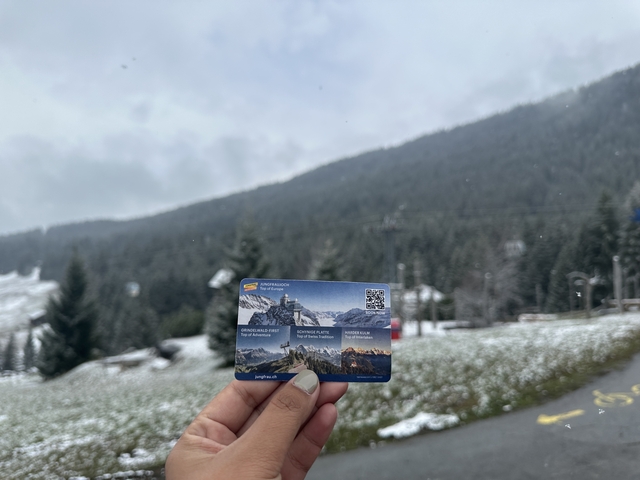 Mountain view with a ticket in the foreground.