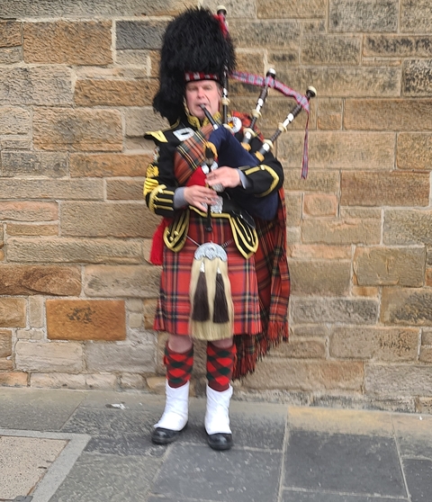 Person in traditional Scottish attire.
