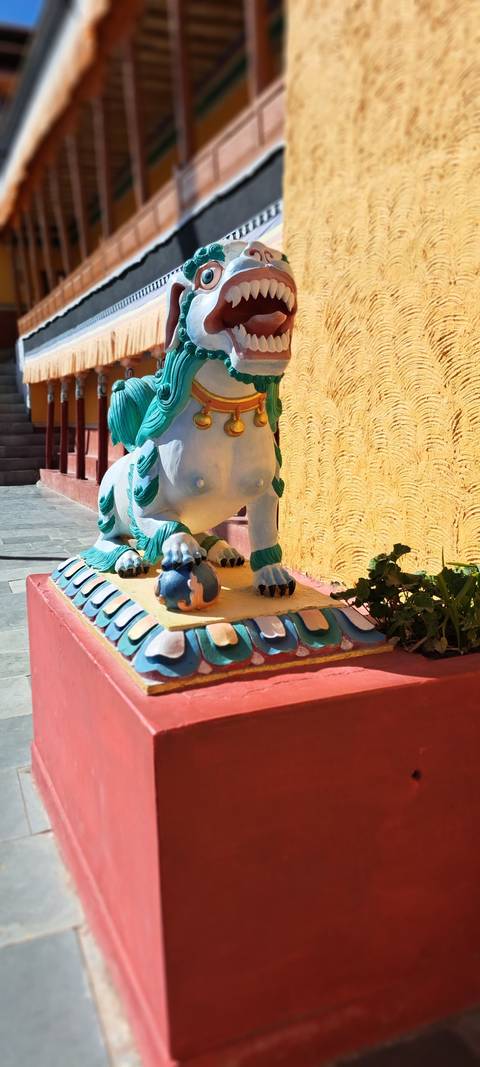 Colorful statue of a mythical creature.