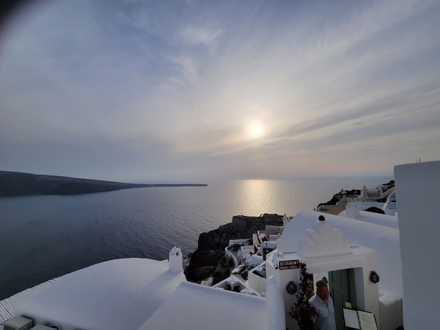 Sunset view over the sea with rooftops